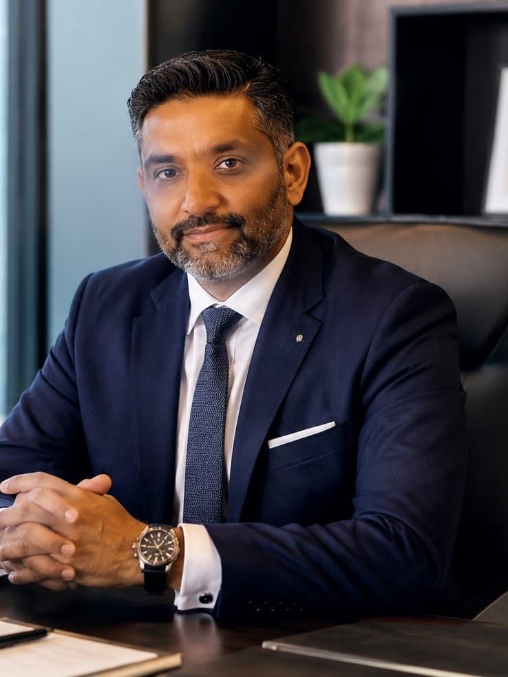 H. Kapuwaththage, Founder and Managing Director of ORANA, at his desk